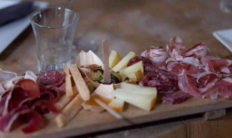 Charcuterie board with assorted meats and cheeses.